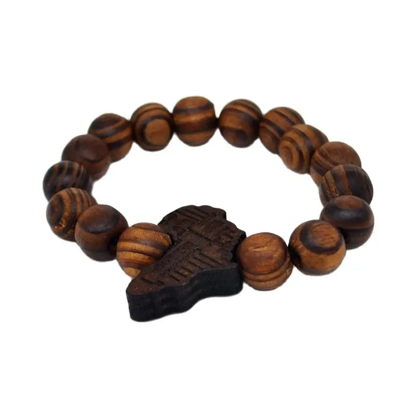 Handcrafted African Roots Wooden Beaded Bracelet with dark and light wood beads. Features an intricately carved Africa-shaped pendant for a unique look.