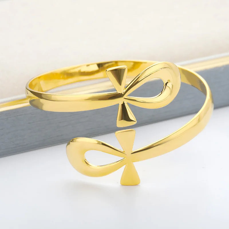 Stylish Ankh Bracelet Bangle in gold stainless steel with dual ankh symbols, ideal for fashion-forward women and mood tracking.