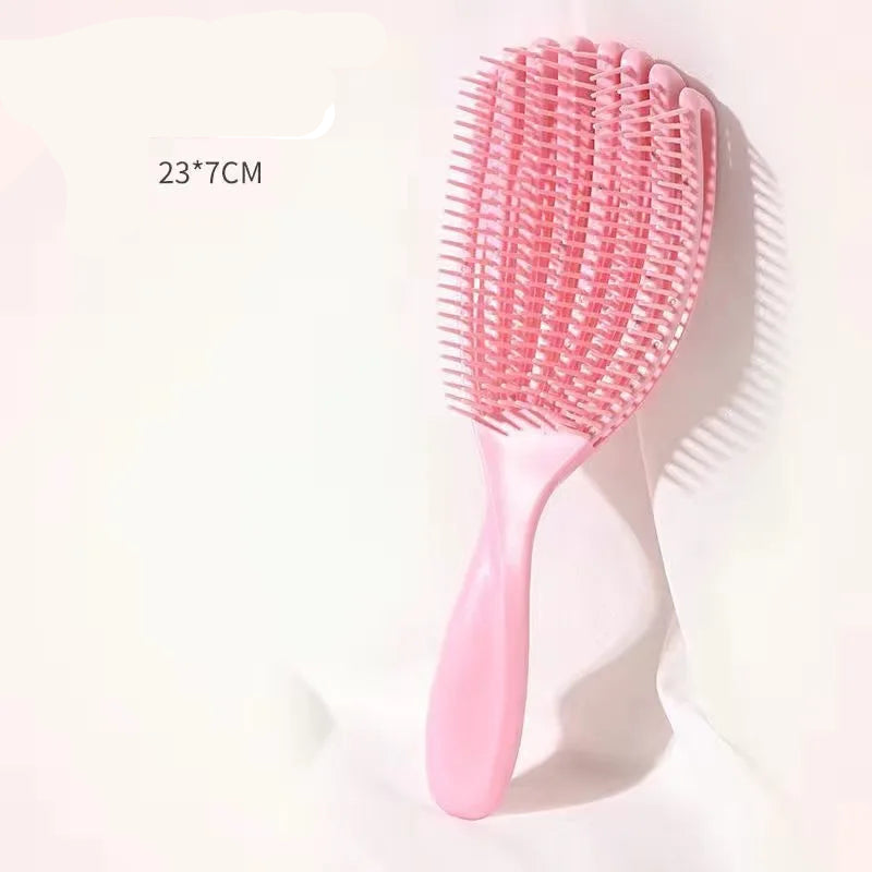 the pink detangling brush with a height of 23.7 cm 