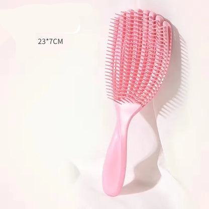 the pink detangling brush with a height of 23.7 cm 