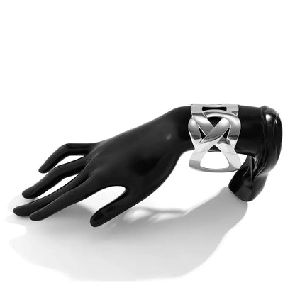 Silver interlocking-loop open cuff on a black mannequin hand, against a white background.