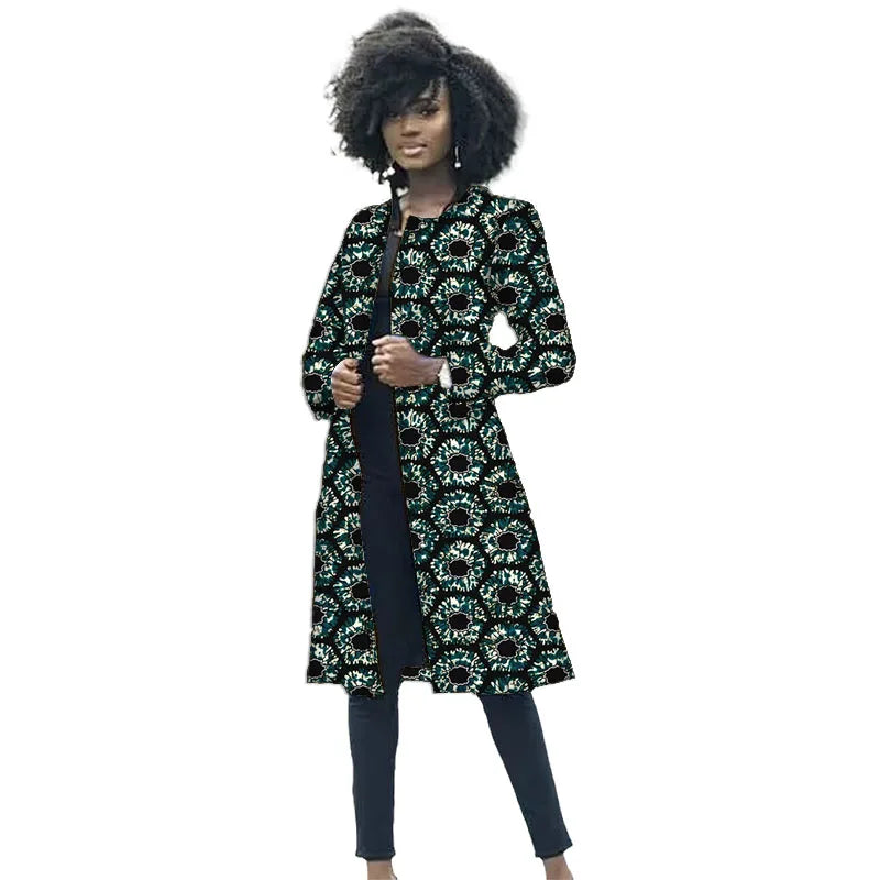 Woman wearing a long floral coat on a white background