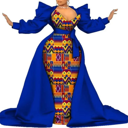 Royal blue satin overlay gown with a colorful geometric print panel and puff sleeves, on a white background.