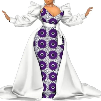 White satin overlay gown with a purple and white circle-print panel and puff sleeves, on a white background.