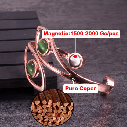 Rose gold magnetic cuff bracelet with green stone accents, shown on a dark textured surface with a circular inset of pure copper wire. Text overlays indicate &