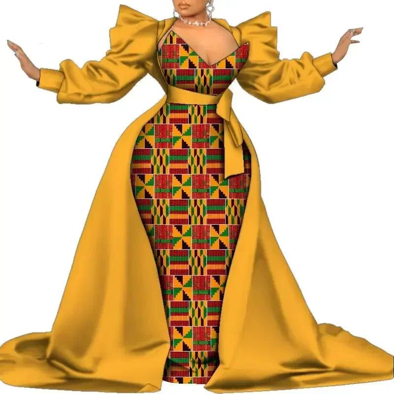 Yellow and patterned dress with long sleeves on a white background