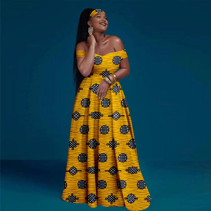 Woman wearing a yellow patterned dress against a blue background