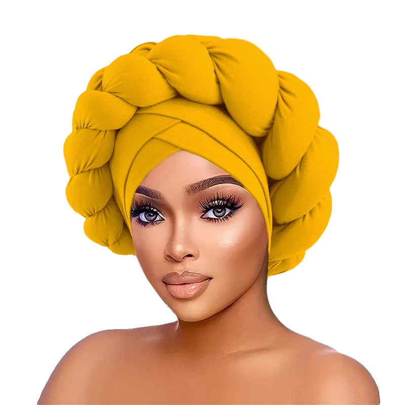 Woman wearing a yellow head wrap on a white background