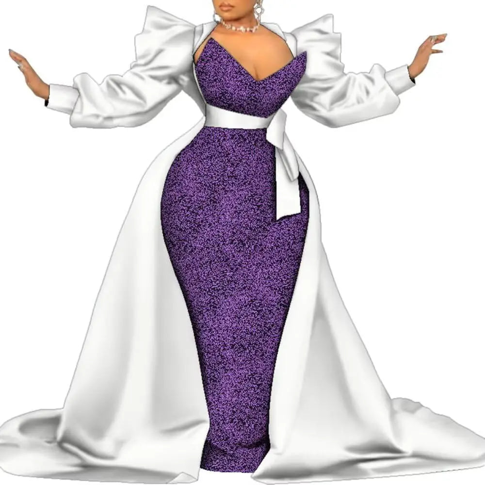 White satin overlay gown with a purple textured panel and a bow at the waist, on a white background.