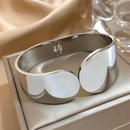The Flly Silver  Geometric Glossy Chunky Cuff Bracelet  on an jewelery box