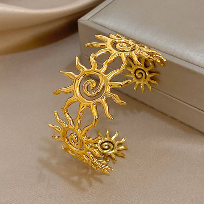 The Golden Spiral Hair Cuff on an jewelery pillowcase