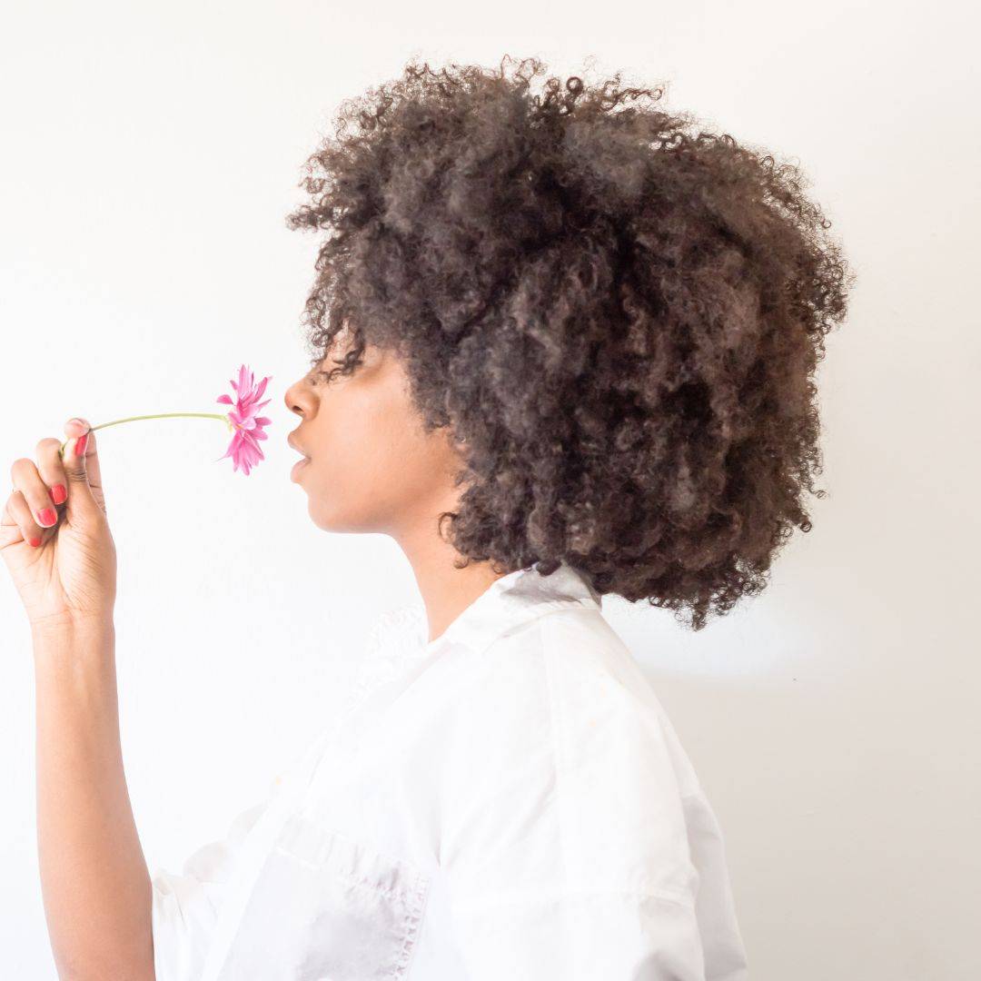 Colorful detangling brushes for curly hair with flexible bristles. Designed for tangle-free and pain-free hair care, perfect for 4C hair types.