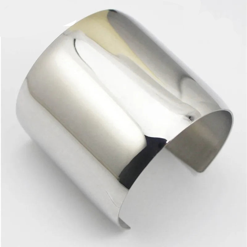 The Wide 316L Stainless Steel Cuff Bracelet in silver on an hite background. 