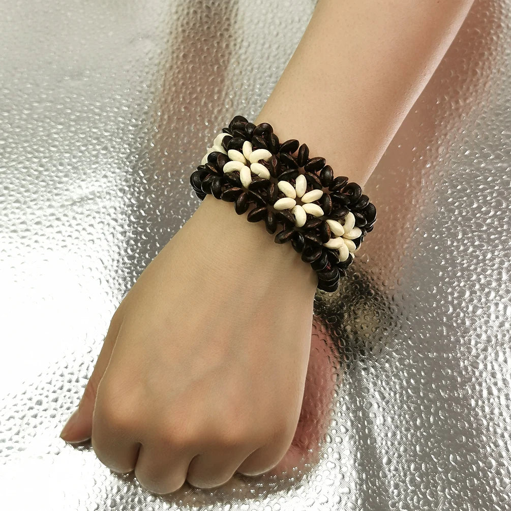 The Wooden Bead Flower Bracelet – Elastic Cuff Bangle for Women on a woman&