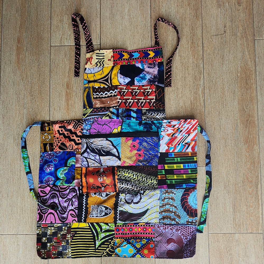 Colorful patchwork apron on a wooden floor