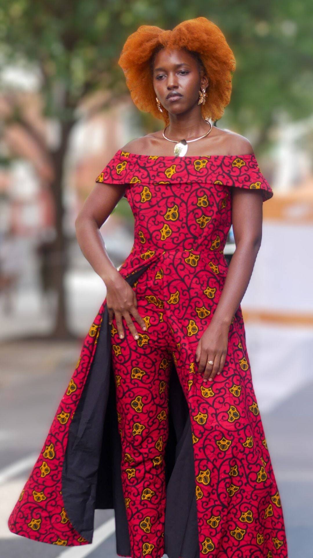 Black Woman wearing an two piece African pantstuit