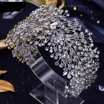 Front view of silver bridal tiara showcasing full coverage crystal design with teardrop accents