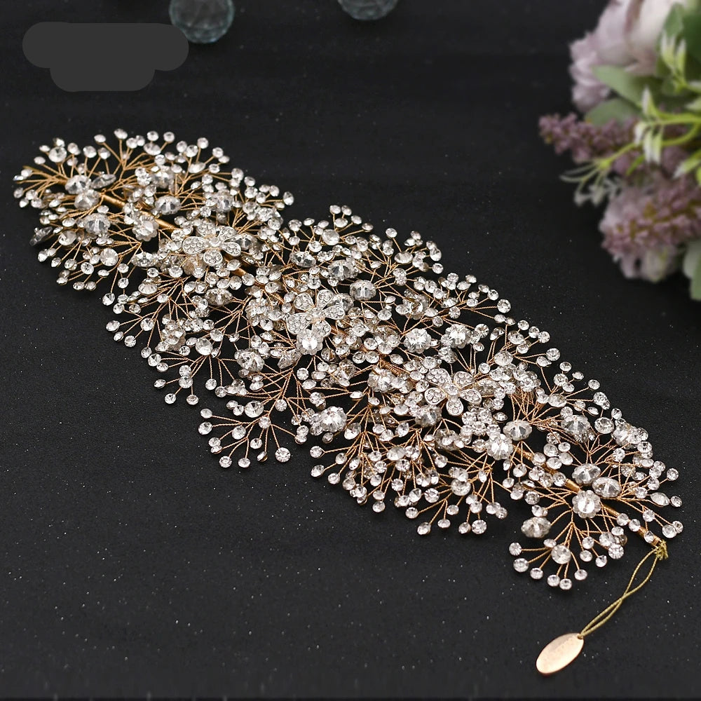 Gold crystal bridal hair vine with sparkling rhinestones and delicate flower clusters