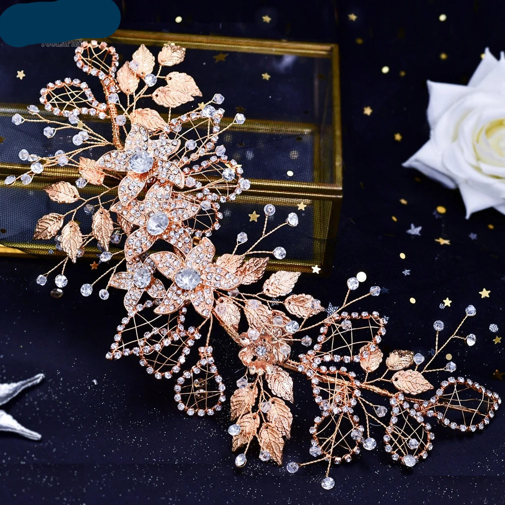 Rose gold floral bridal hairpiece with crystal flowers and intricate leaf details