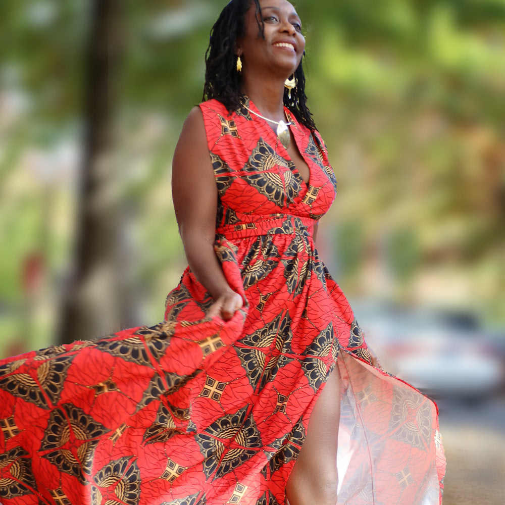 African Infinity Dress - Black woman wearing the Convertible Dress in African Print